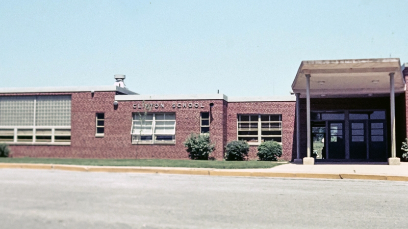 Photograph of the front exterior of Clifton Elementary School taken in the mid-1980s.