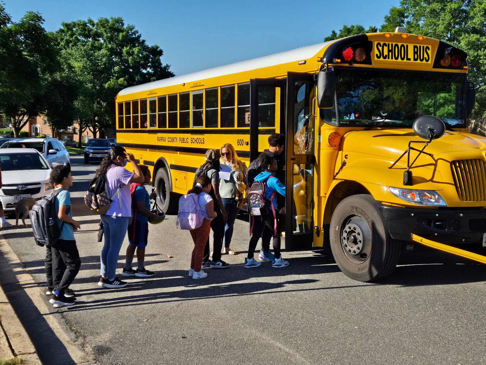 Hollin Meadows ES students boarding a school bus