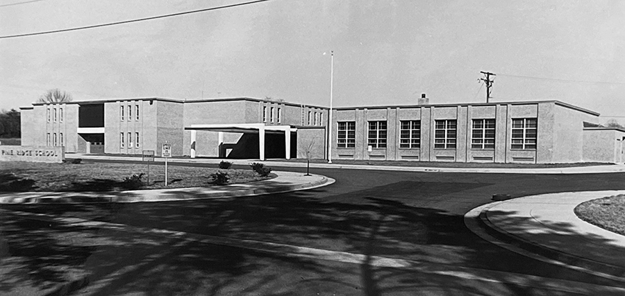 Photograph of the front exterior of Pine Ridge Elementary School taken in the late 1960s.