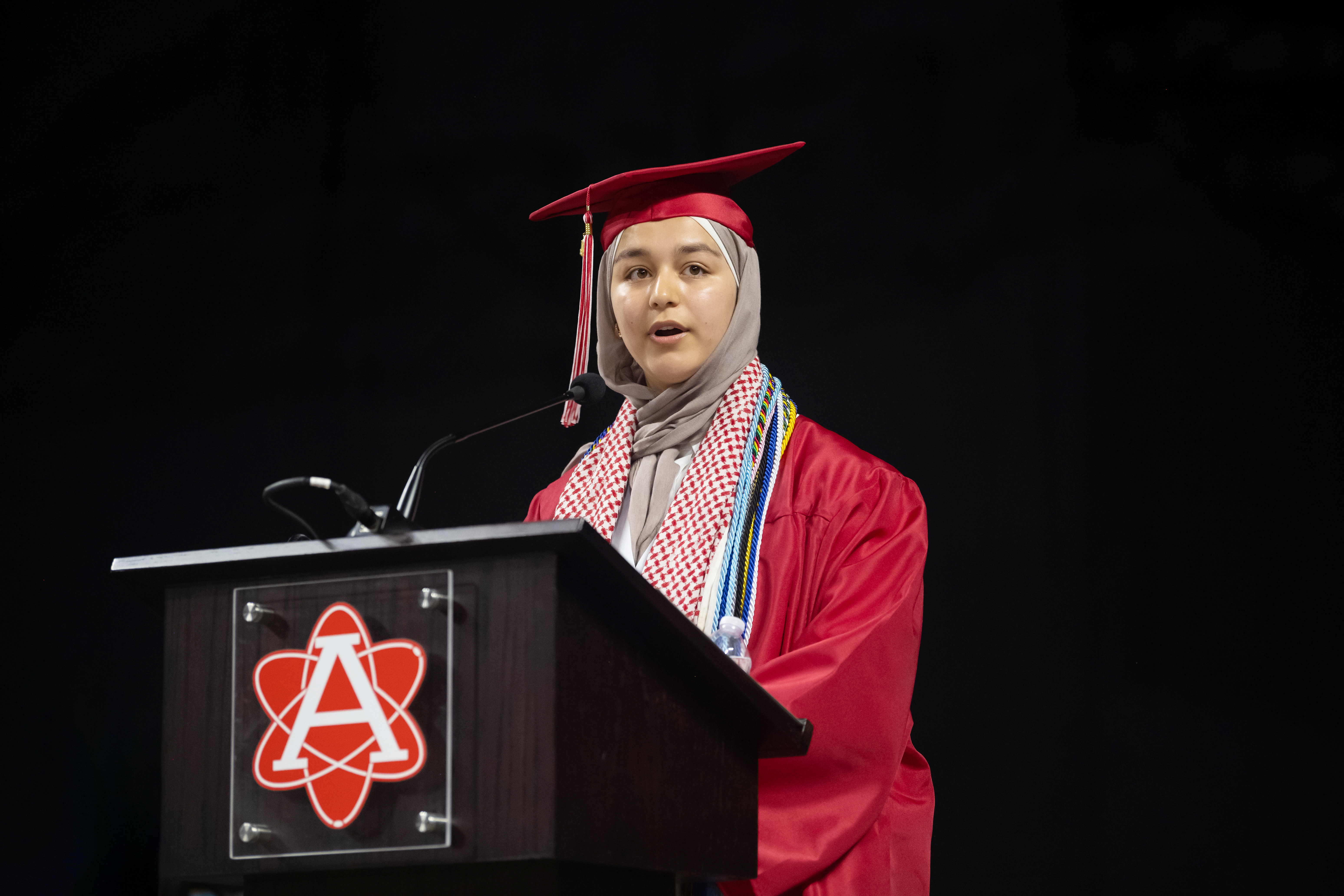 Annandale HS Class of 2024 alum and co-founder of Dunya Club Sosan speaking at her graduation