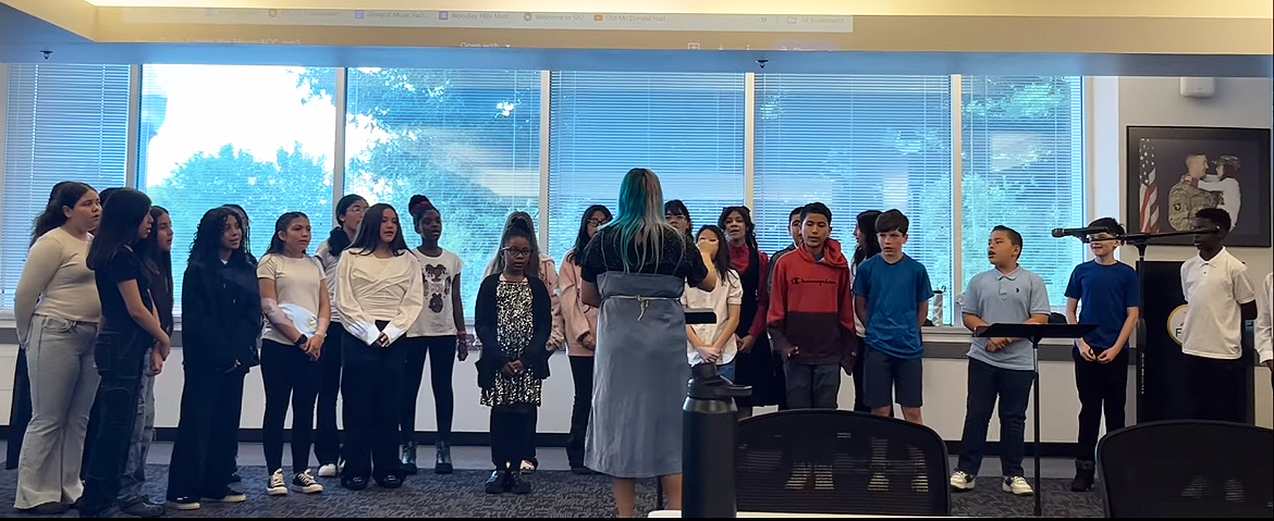 The Woodley Hills ES chorus performs at Gatehouse