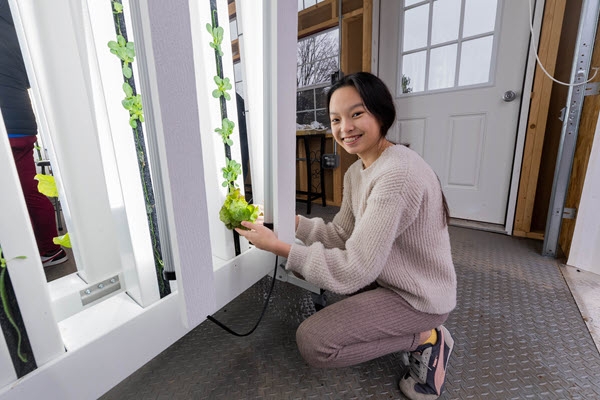 student with plant