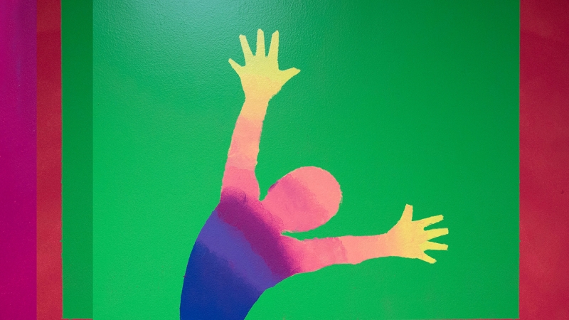 student art of a person with their arms in the air