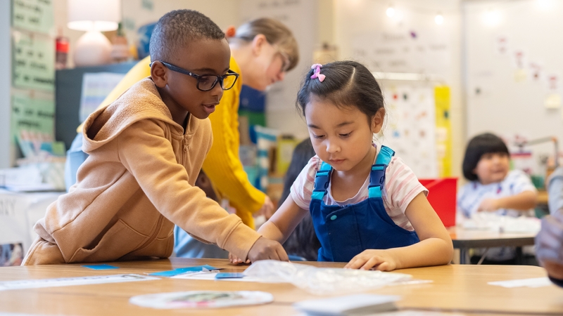 Kindergarten students in Angelica Feldman’s class collaborate on a math assignment at Riverside Elementary School.