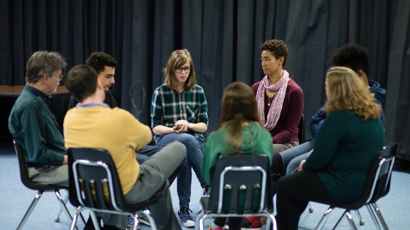 Students and staff sitting in a Restorative Justice Circle