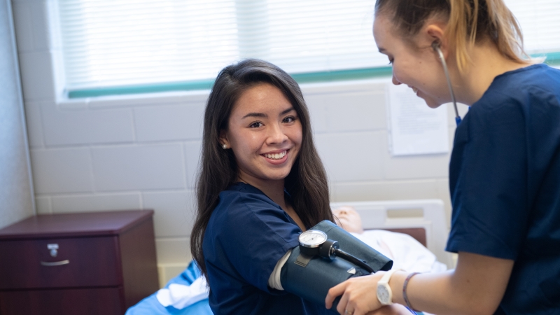 Nurse taking a patient's blood pressure