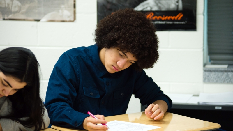 Male student taking a test