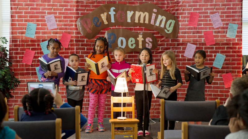 first grade students reading poetry