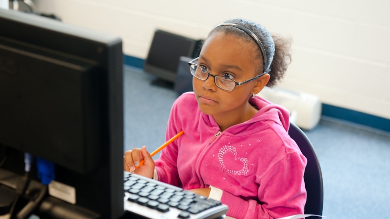 student on computer