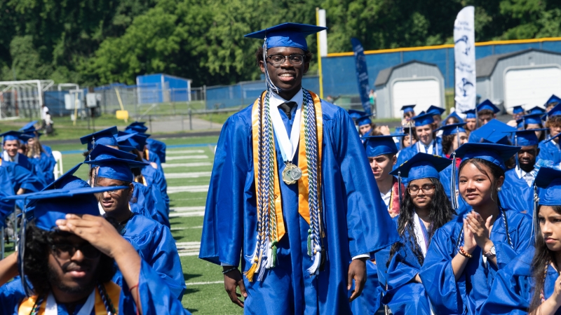 Fairfax High School graduate walking down the aisle. 