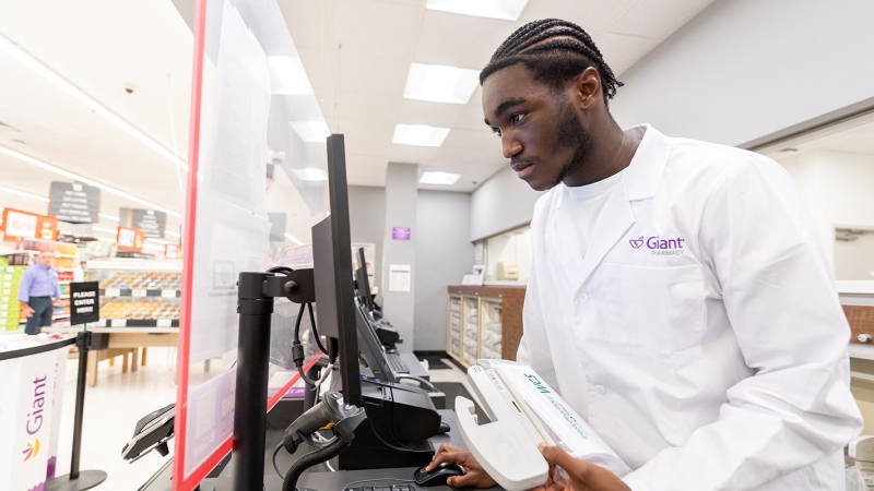 student working in a Giant pharmacy