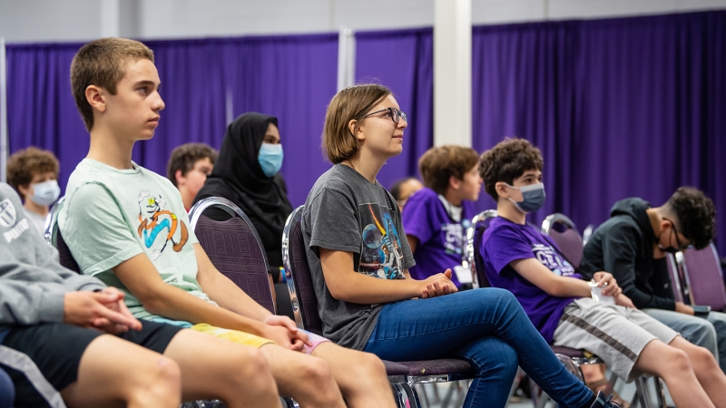 Students listen to a speaker from NASA at the CTE Summer Academy. 