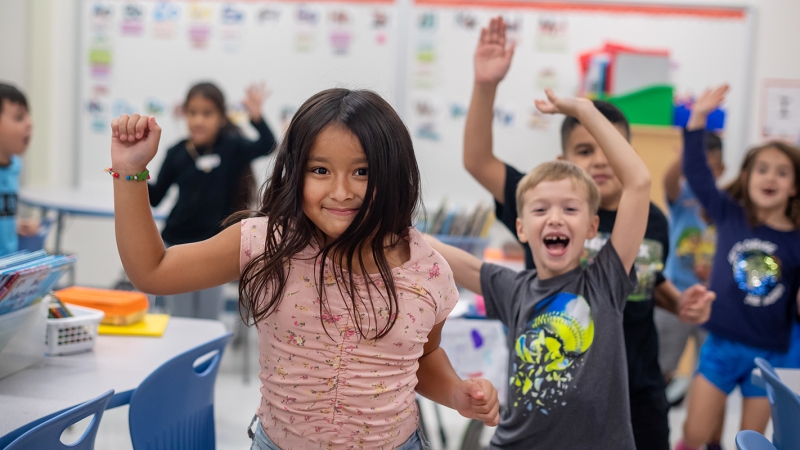 Kids dancing in classroom