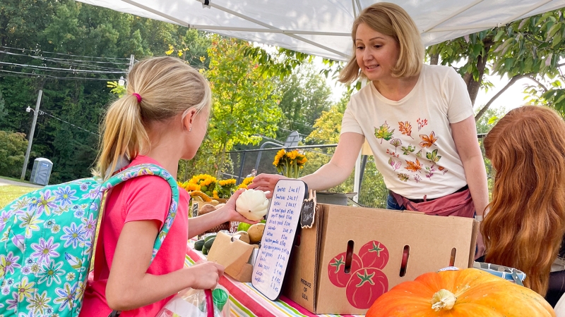 Parent and student volunteers sell healthy food items to hungry shoppers at Willow Springs Elementary School.