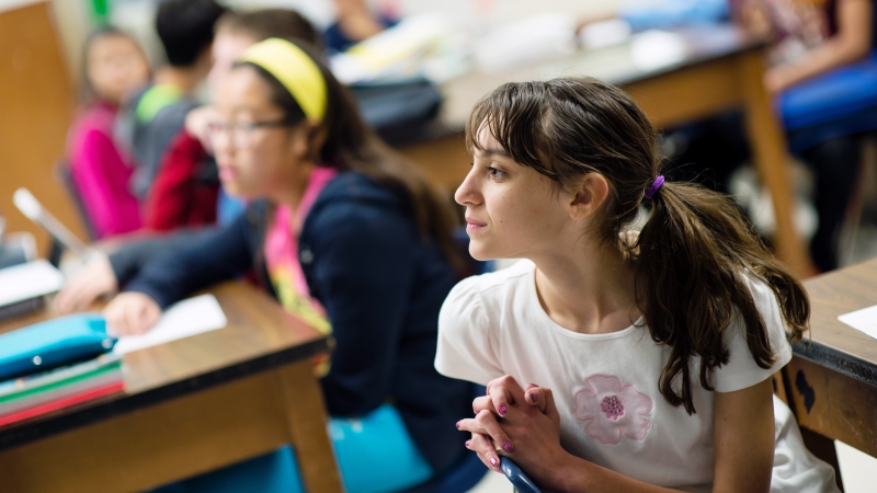 Student listening intently during class.