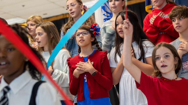 Students at Fort Belvoir Upper School participate in a Veterans Day Celebration