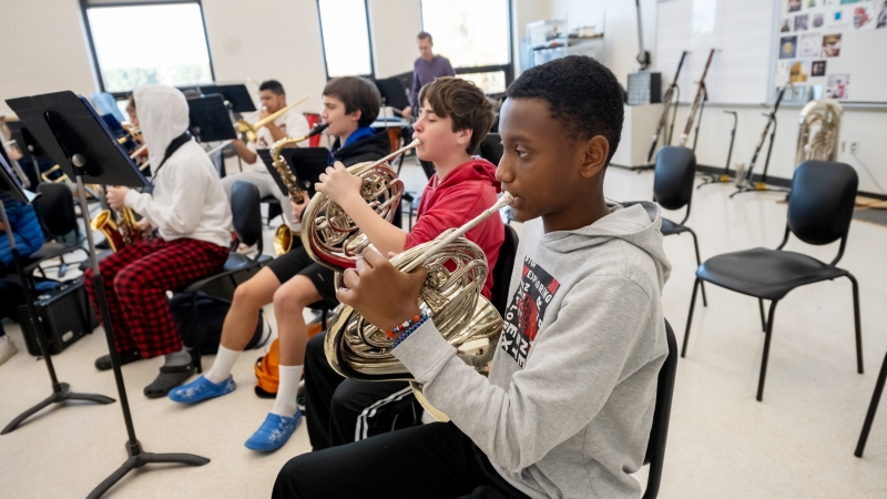 Students play instruments