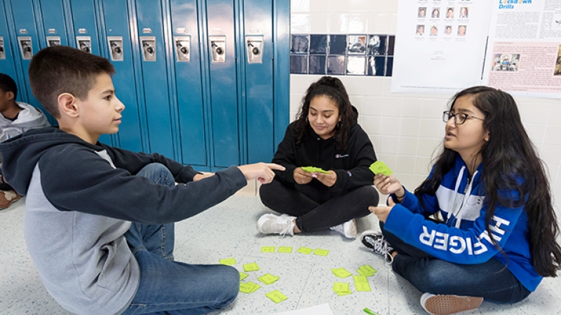 Students sitting together working on a project