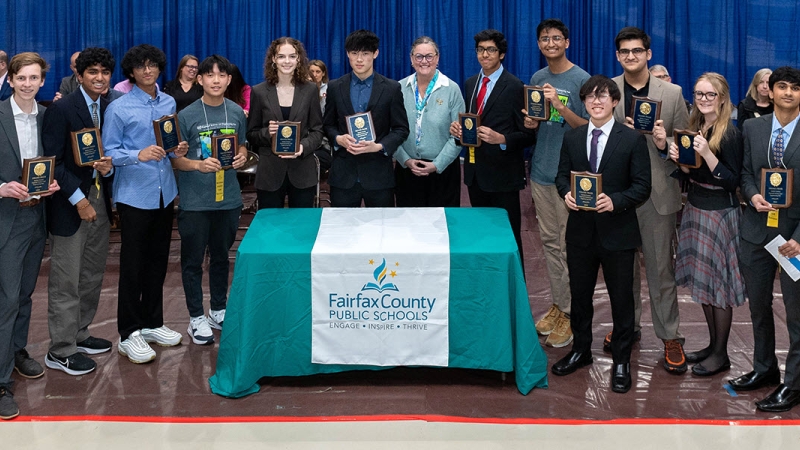 Dr. Reid with science fair winners