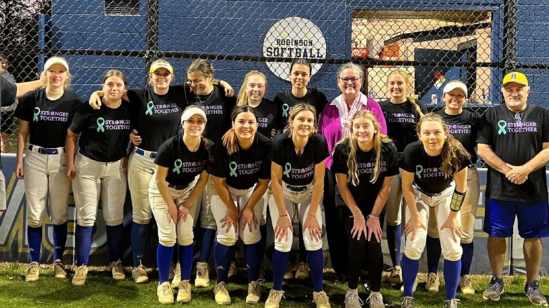 Dr. Reid with Robinson SS softball team