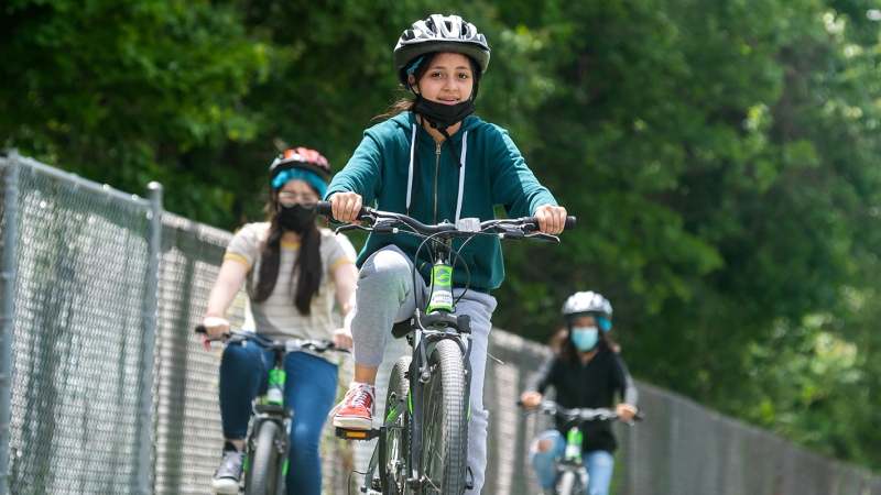 A Poe Middle School sixth-grader practices safe biking during a physical education unit.