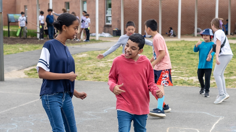 Two Bush Hill Elementary School students practice together for upcoming Little Feet Meet.