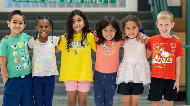 six elementary school students in lobby of school