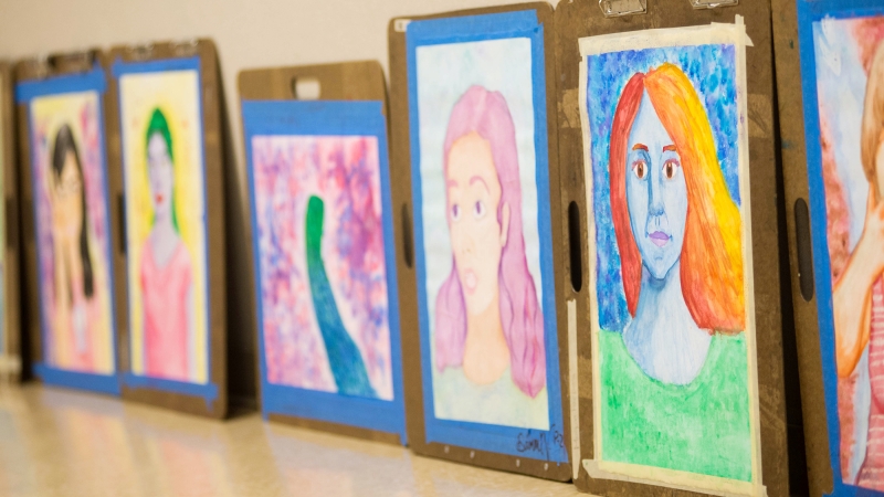 Portrait art by students.