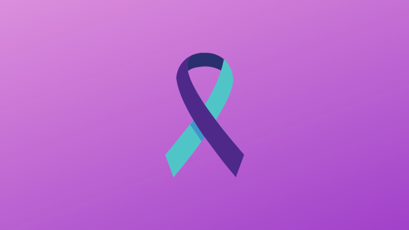 Blue and Purple Suicide Prevention Ribbon on a purple background