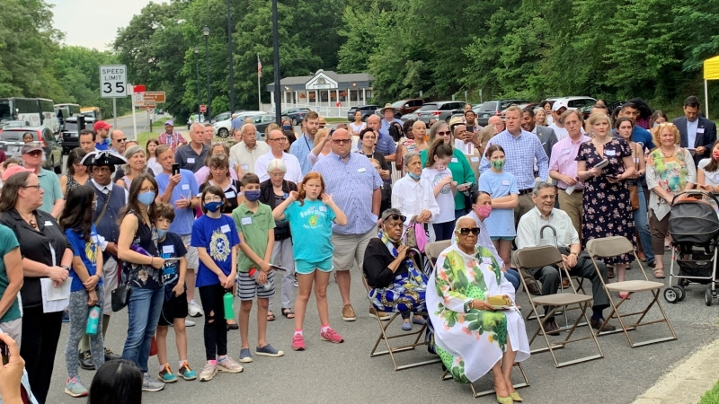 A crowd gathered on Juneteenth to see the unveiling of the historic roadside marker