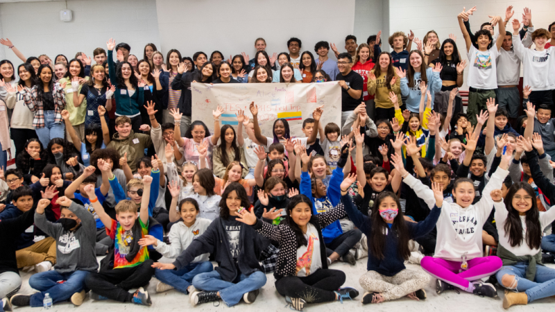 students pose for photo