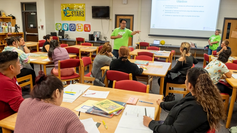 Parents report for Thursday evening class at Lutie Lewis Coates Elementary School in Herndon.