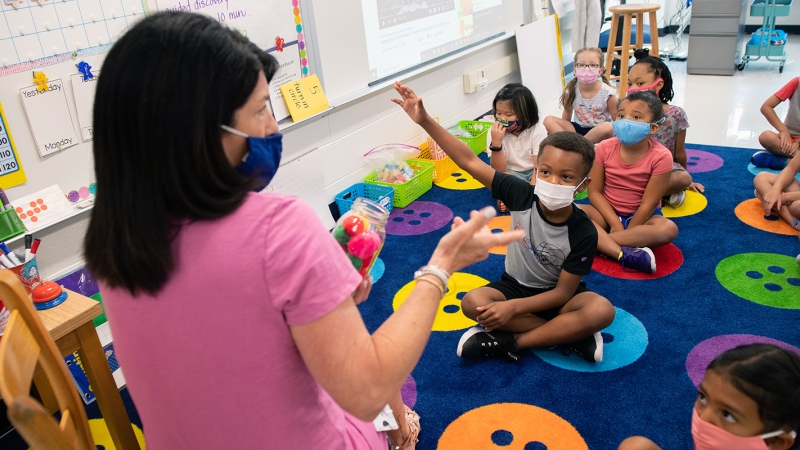 Silverbrook Elementary School teacher Kathryn Desmond engages summer program students in discussion about friendship.