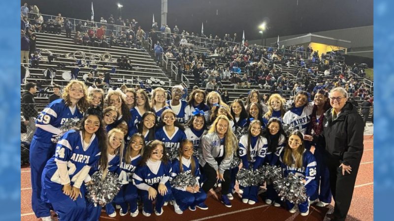 Dr. Reid with students at the Fairfax HS 2023 homecoming football game