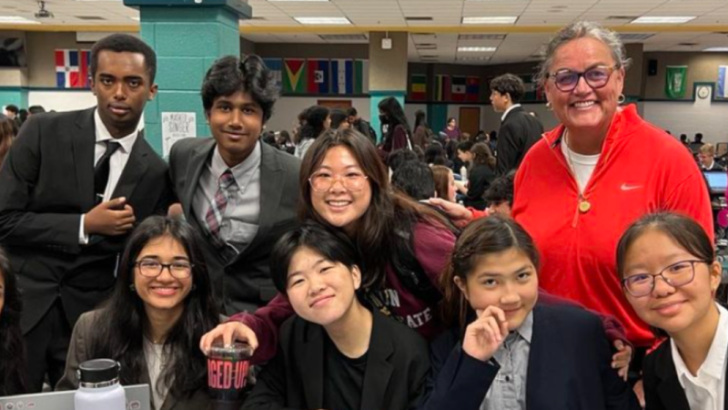 Dr. Reid with students at the WCFL regional debate tournament