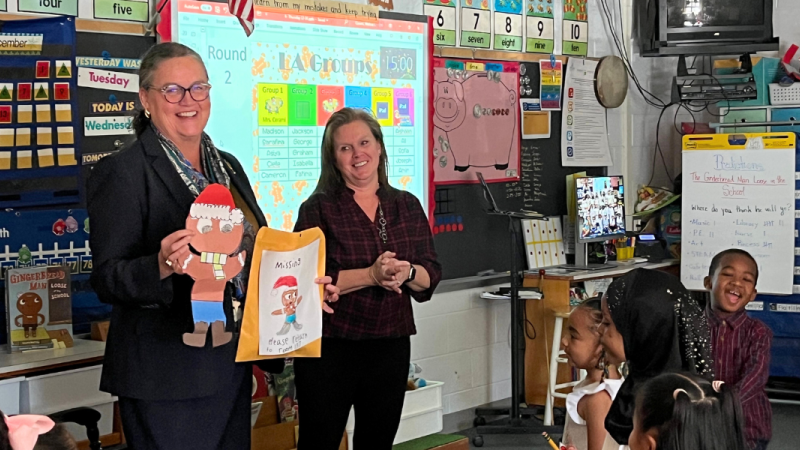 Dr. Reid with students and staff at Halley ES