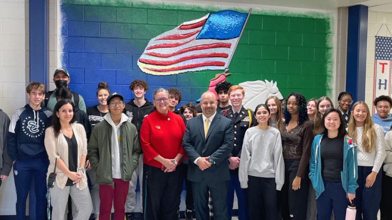 Dr. Reid with students and staff at the South County HS Sensory Stallion mural tribute