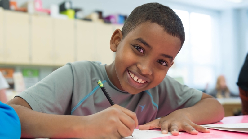 Photo of a student writing