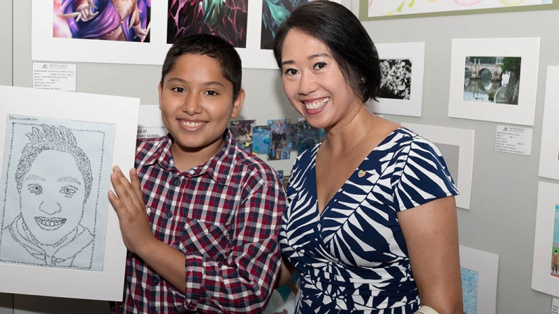 photo of mother and son at art show