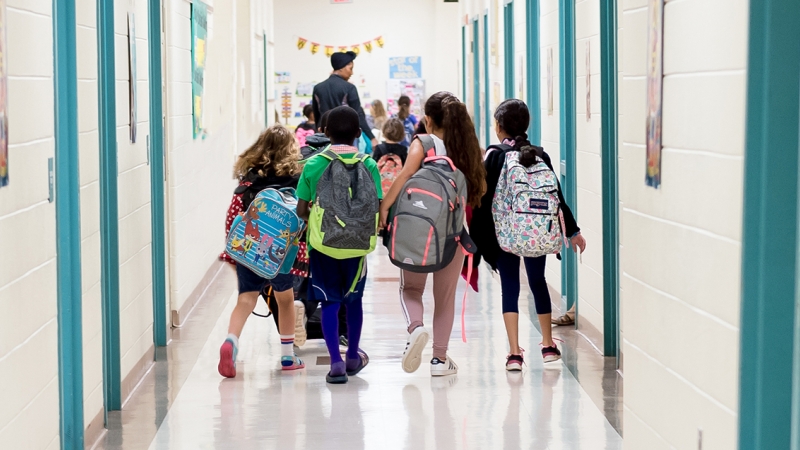 students walking in hallway