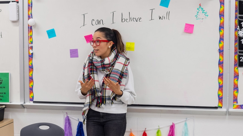 a high school student presenting in class