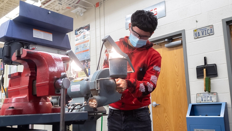 a student practicing hands on learning in a trade an industrial course