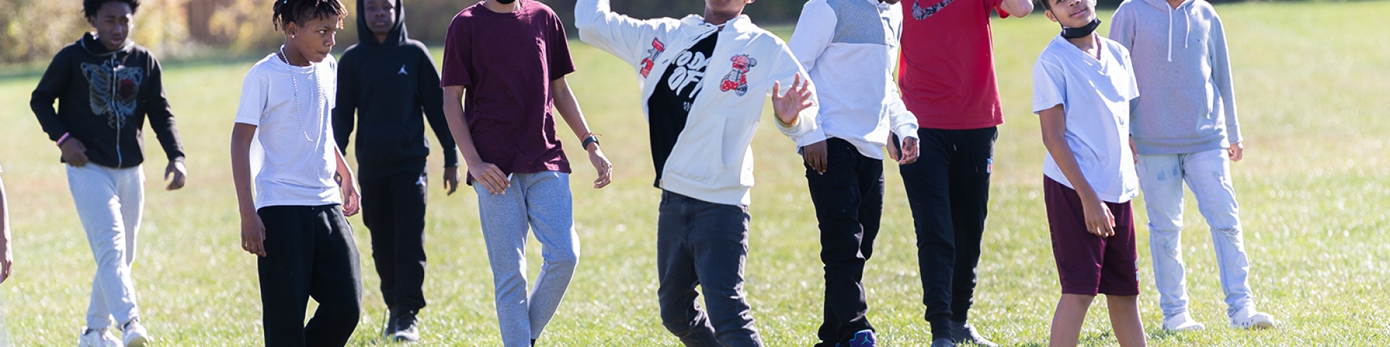 Children playing on the field during recess