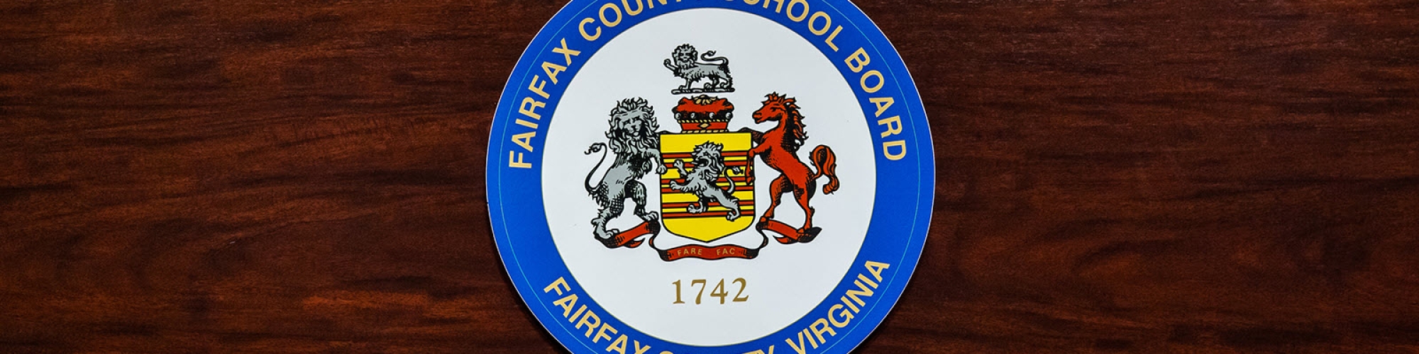 Official Seal of the Fairfax County School Board on the School Board Dais