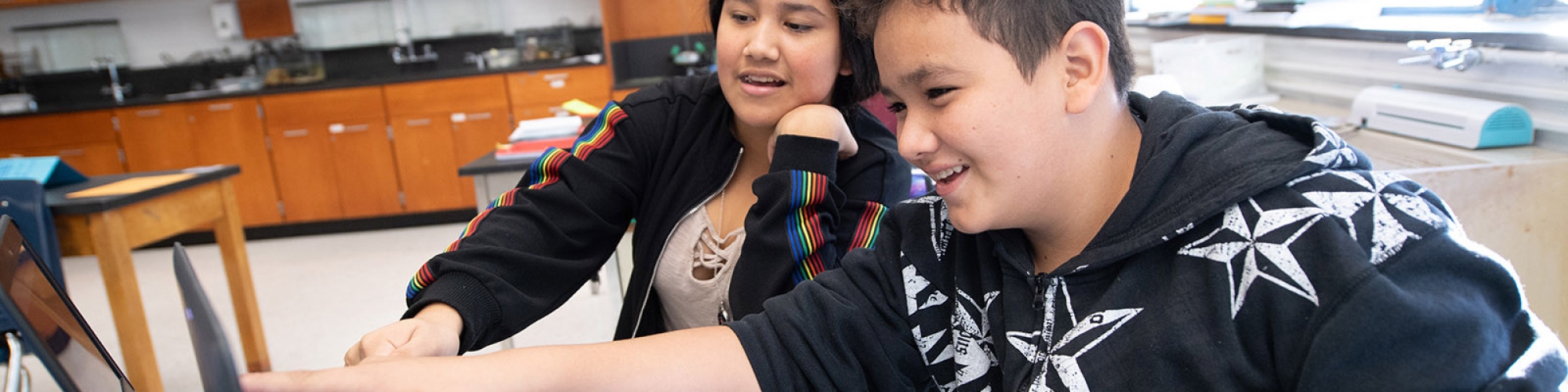 two students using a computer