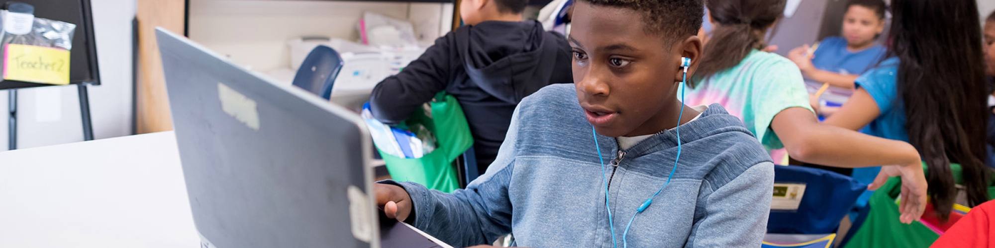 a photo of a student using a computer