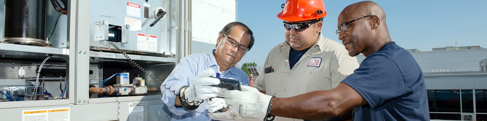 a photo of three employees