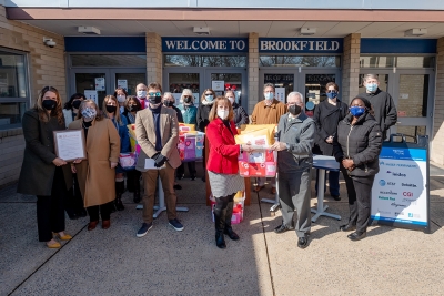 Group of staff in front of Brookfield Elementary